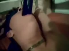 A non-professional bbc slut wearing a blindfold is secured and screwed into the opening.